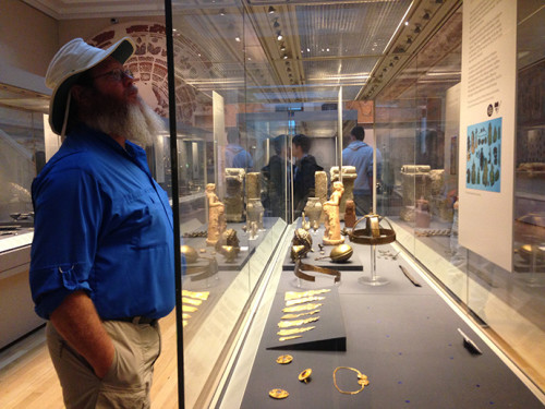 John peruses artifacts in the Roman Britain gallery